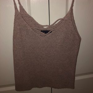 sweater/knit material light purple/brown colored